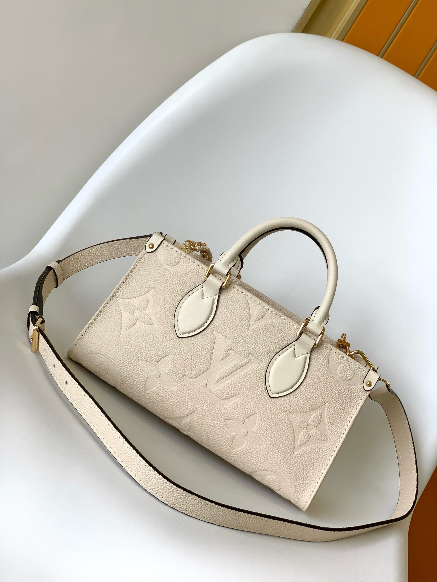 Louis Vuitton OnTheGo _East West Bag Cream with Gold Hardware