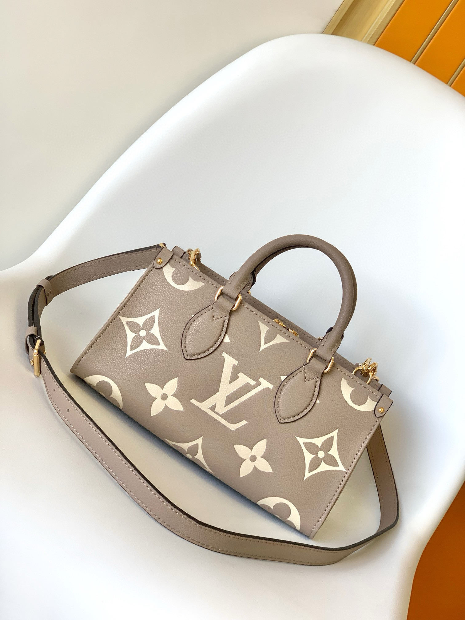 Louis Vuitton OnTheGo _East West Bag Dove/Cream with Gold Hardware