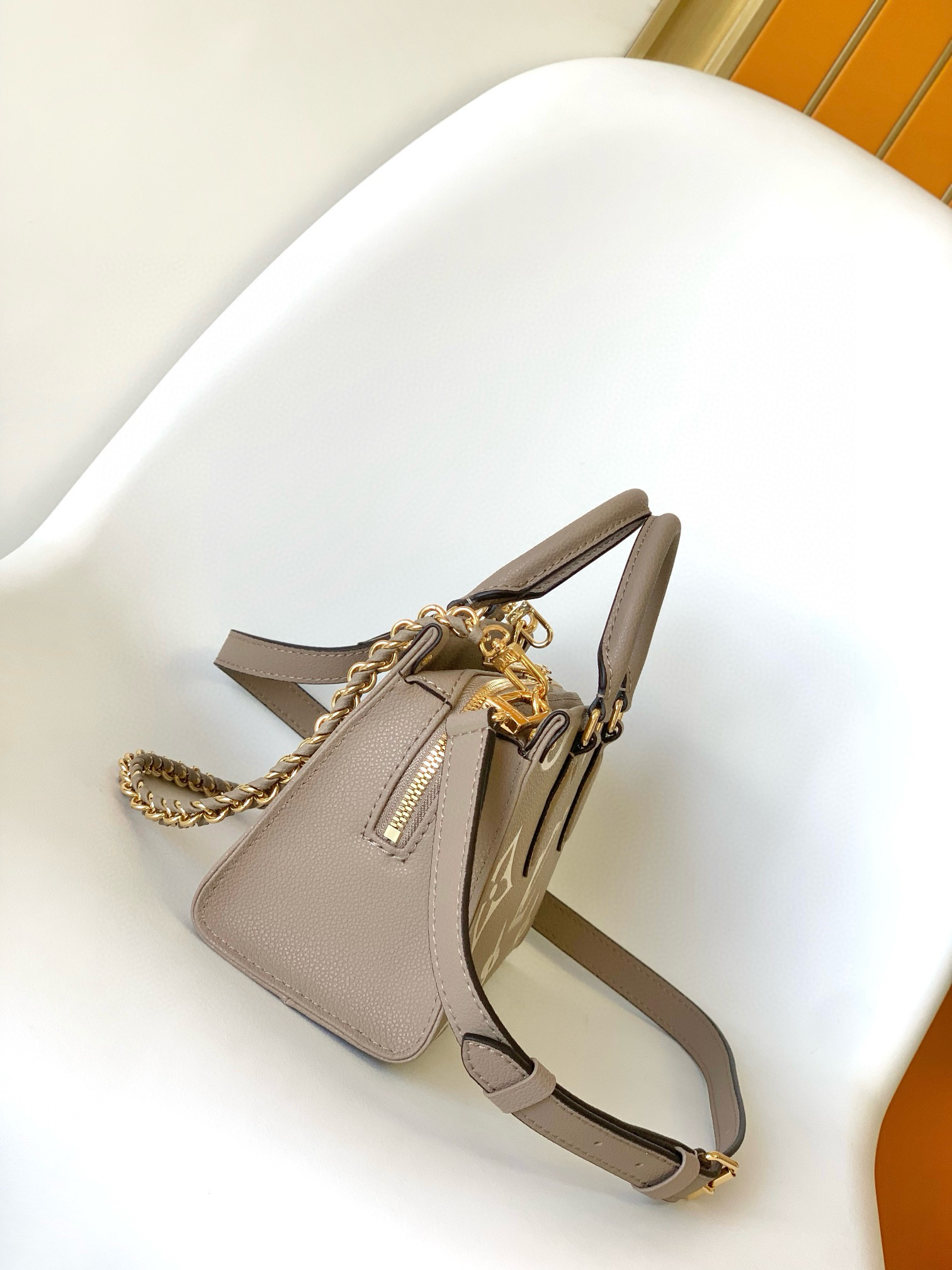 Louis Vuitton OnTheGo _East West Bag Dove/Cream with Gold Hardware