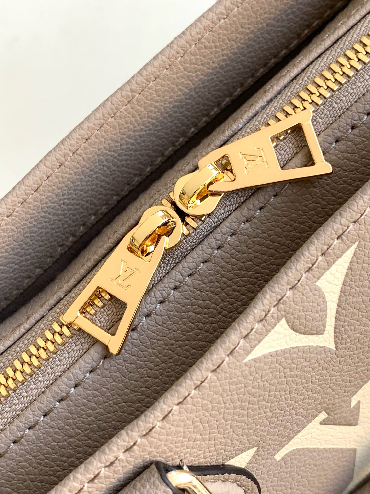 Louis Vuitton OnTheGo _East West Bag Dove/Cream with Gold Hardware