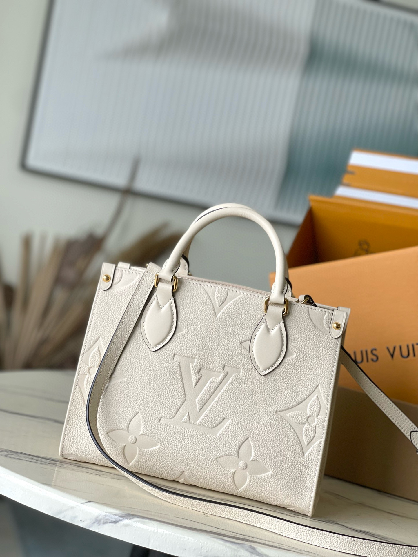 Louis Vuitton OnTheGo PM Bag Cream with Gold Hardware