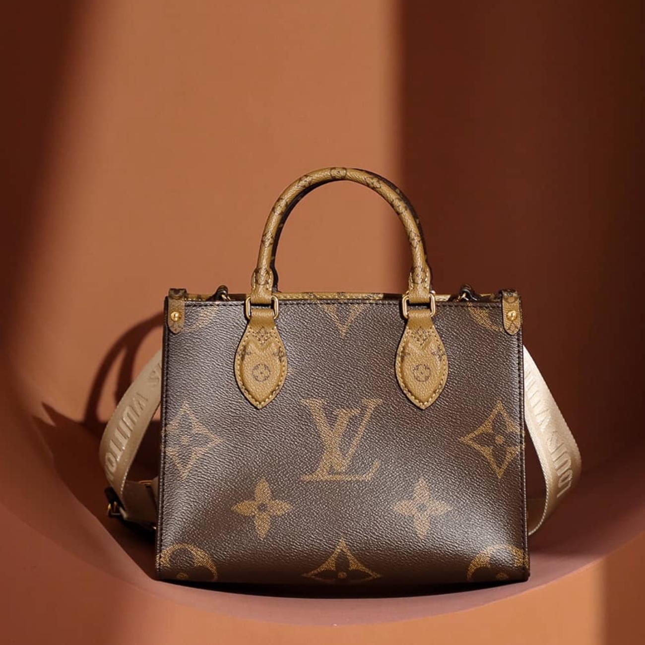 Louis Vuitton OnTheGo PM Bag Monogram and Monogram Reverse with Gold Hardware