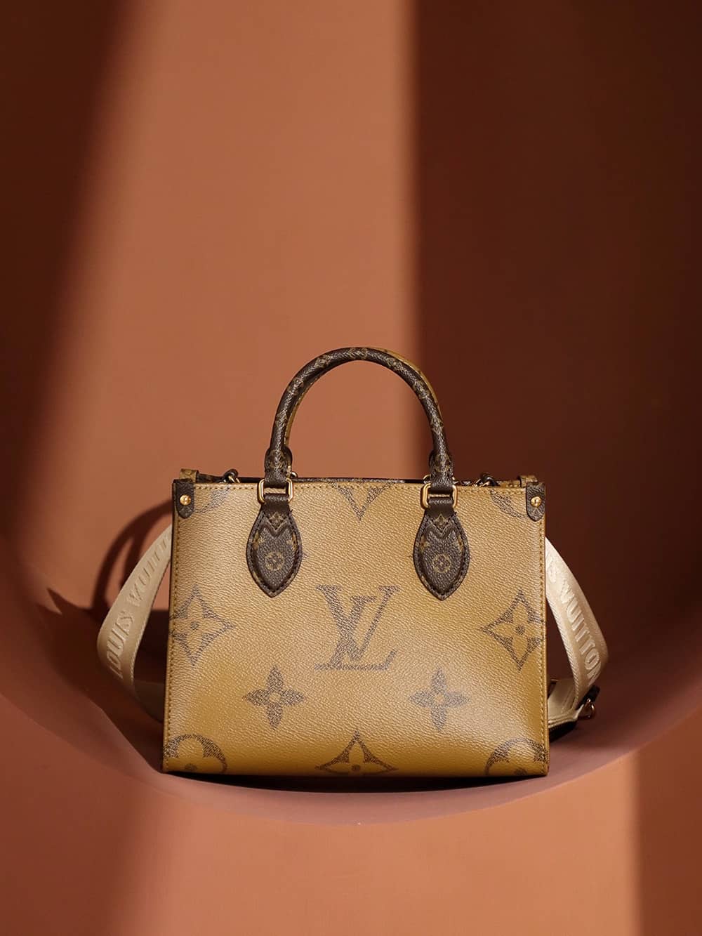 Louis Vuitton OnTheGo PM Bag Monogram and Monogram Reverse with Gold Hardware