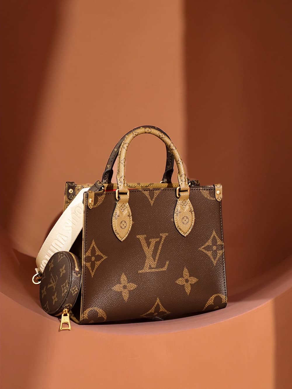 Louis Vuitton OnTheGo PM Bag Monogram and Monogram Reverse with Gold Hardware