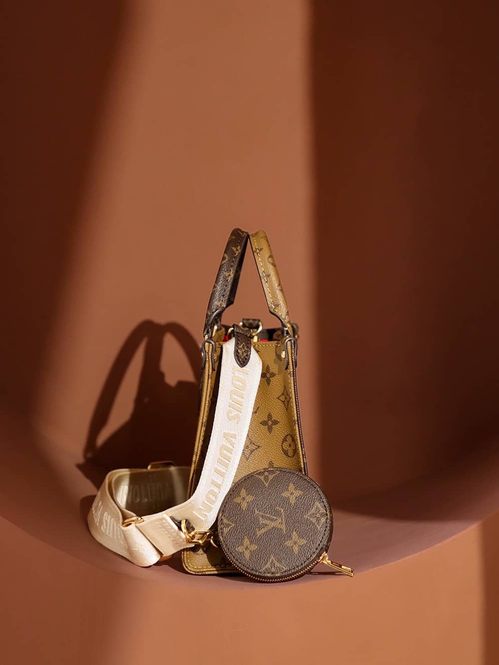 Louis Vuitton OnTheGo PM Bag Monogram and Monogram Reverse with Gold Hardware