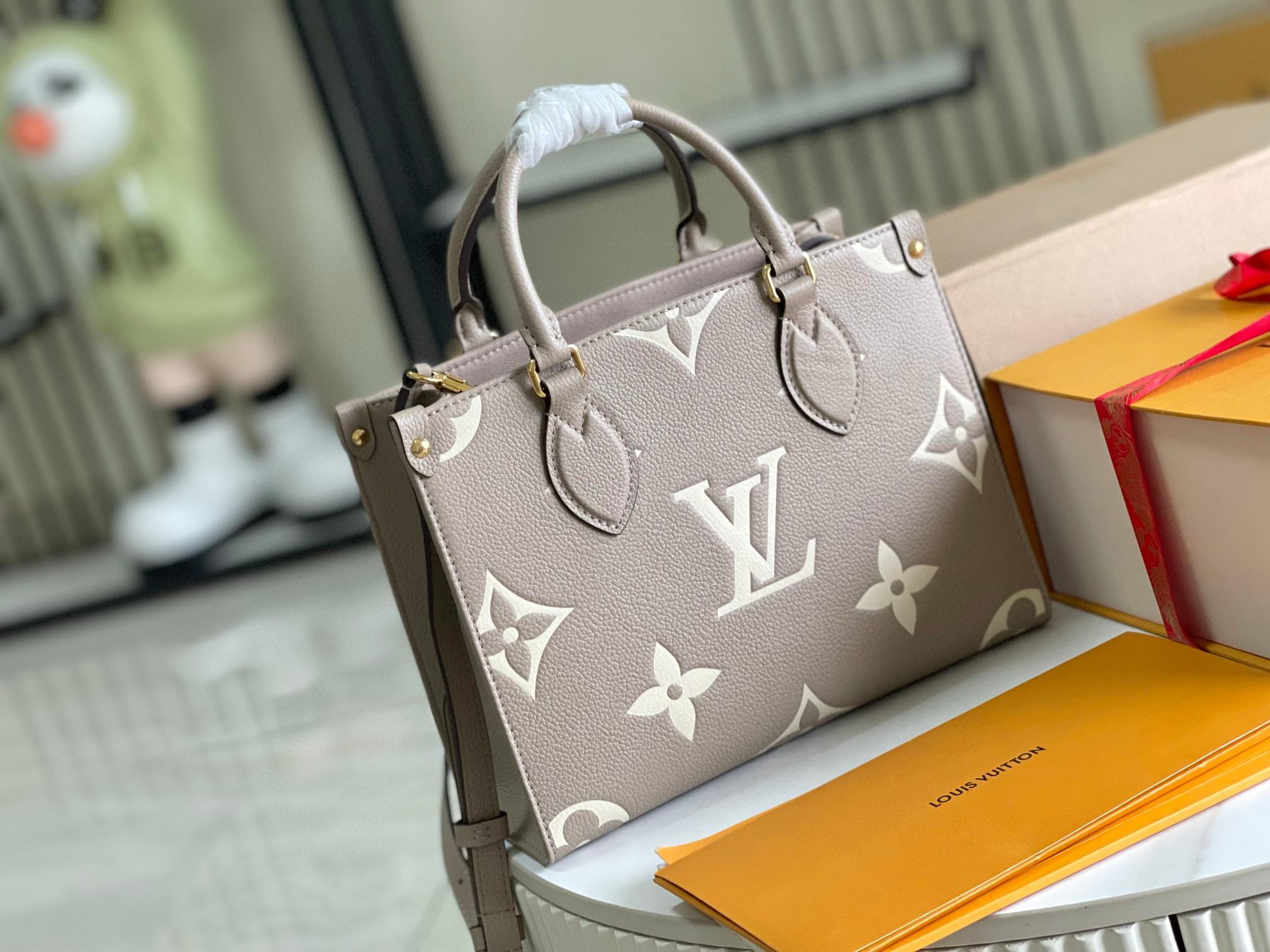 Louis Vuitton OnTheGo PM Bag Dove/Cream with Gold Hardware