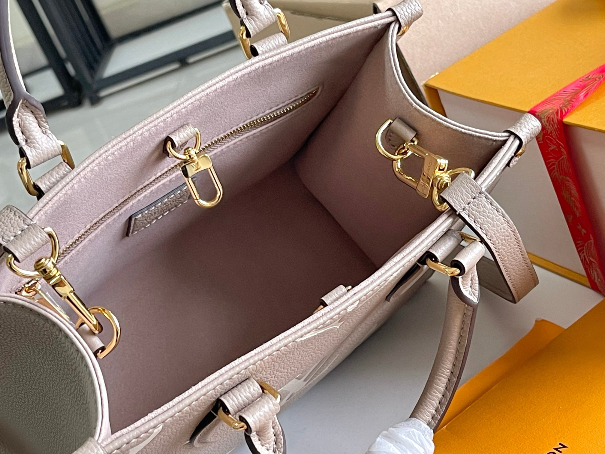 Louis Vuitton OnTheGo PM Bag Dove/Cream with Gold Hardware